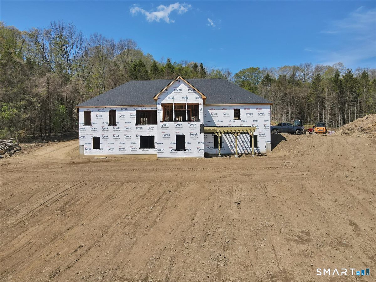103 South Street Extension Coventry, CT 06238 - Photo 6 of 17 a view of a house with a yard