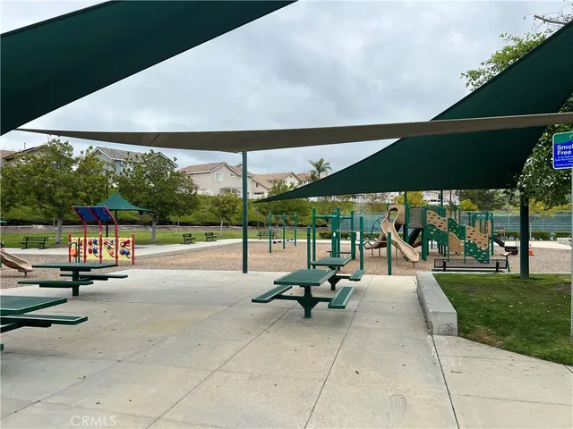 a view of a patio with a backyard