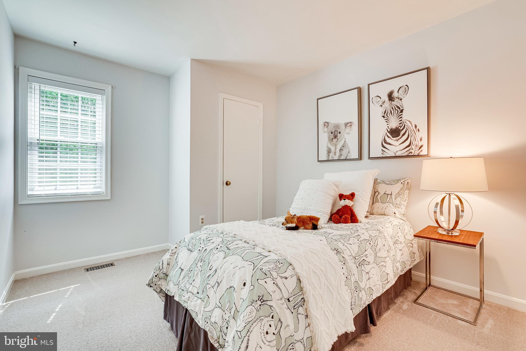 11962 Sentinel Point Court Reston, VA 20191 - Photo 37 of 62 The second bedroom overlooks the trees.