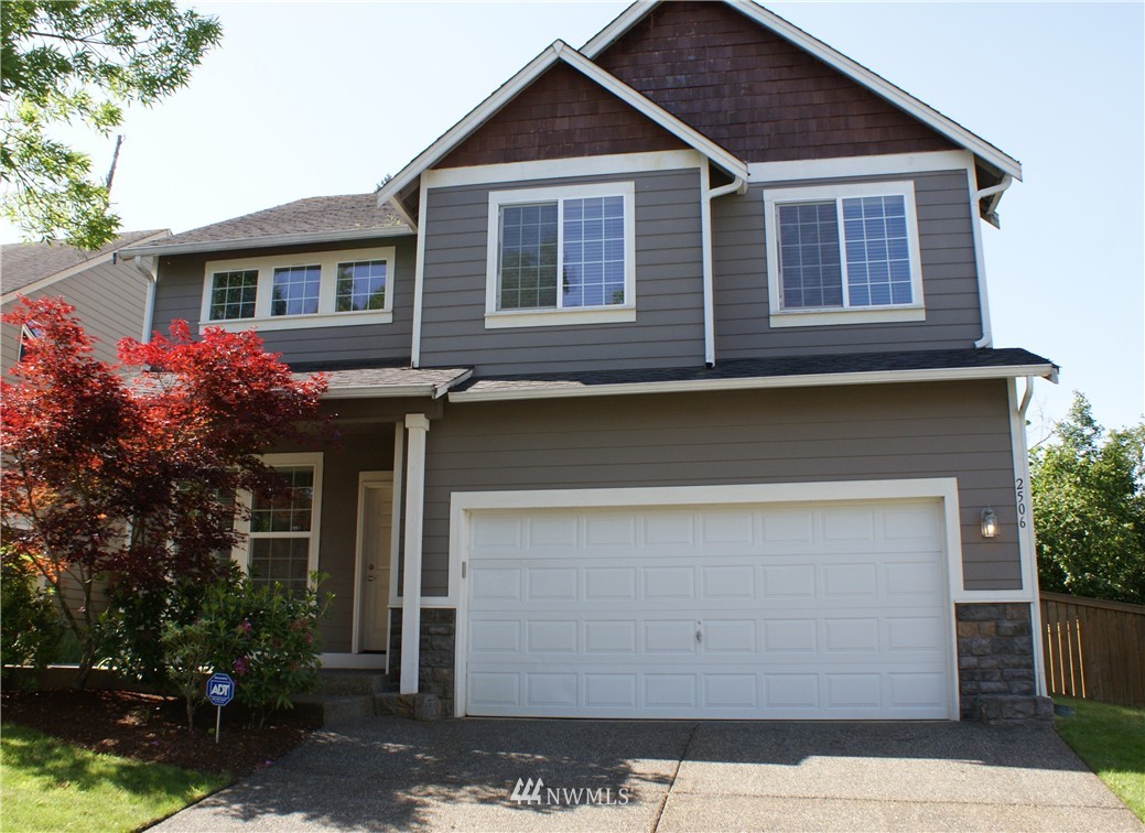 2506 Stafford Way Bothell, WA 98012 - Photo 1 of 1 a front view of a house with a yard