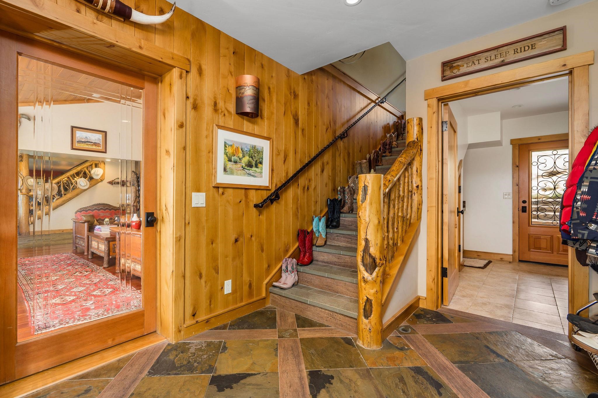 716 Aspen Springs Ranch Road, Unit 59012 Mammoth Lakes, CA 93546 - Photo 29 of 50 a view of an entryway with wooden floor and a livingroom view