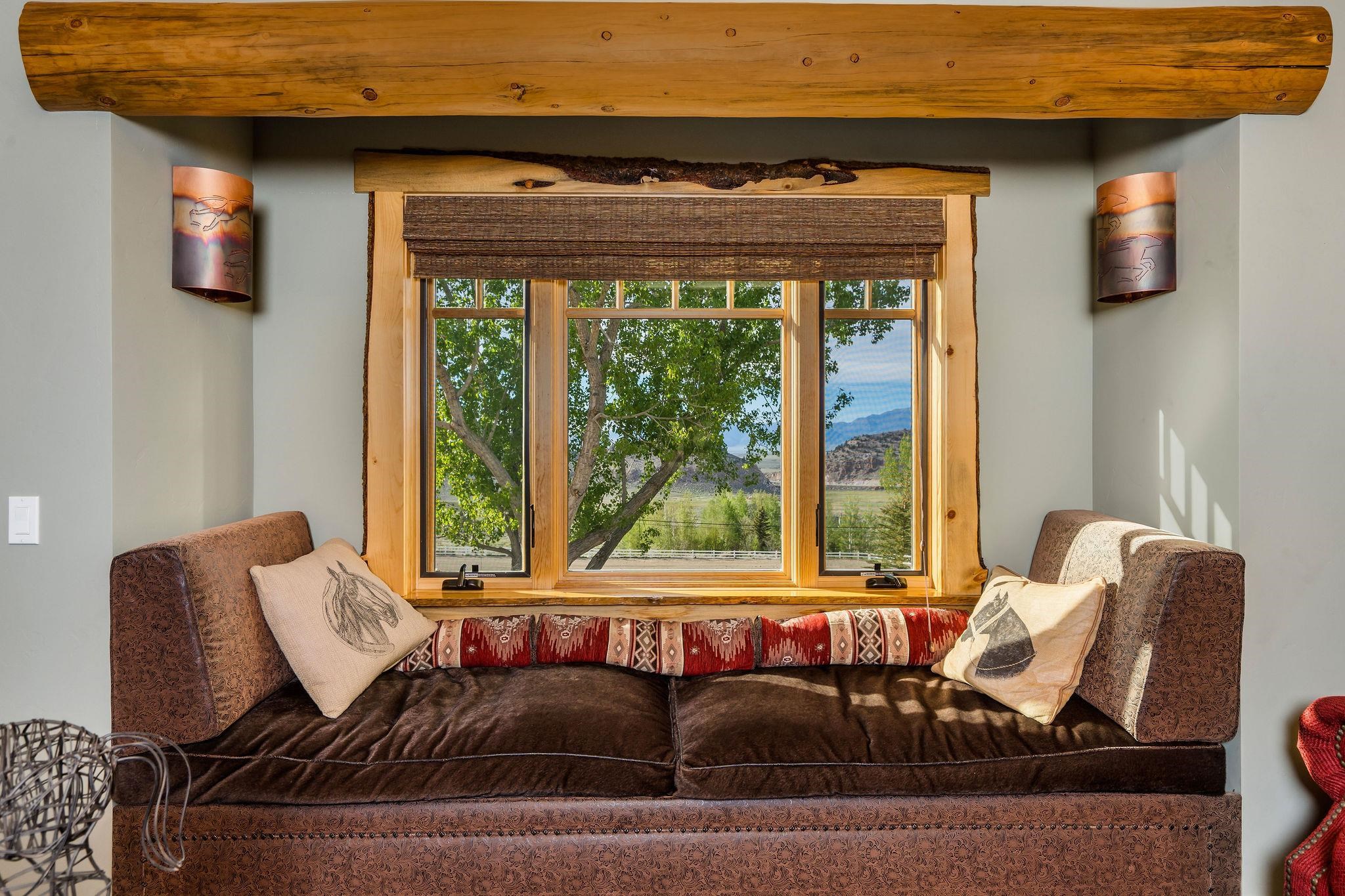 716 Aspen Springs Ranch Road, Unit 59012 Mammoth Lakes, CA 93546 - Photo 32 of 50 a living room with furniture and large windows