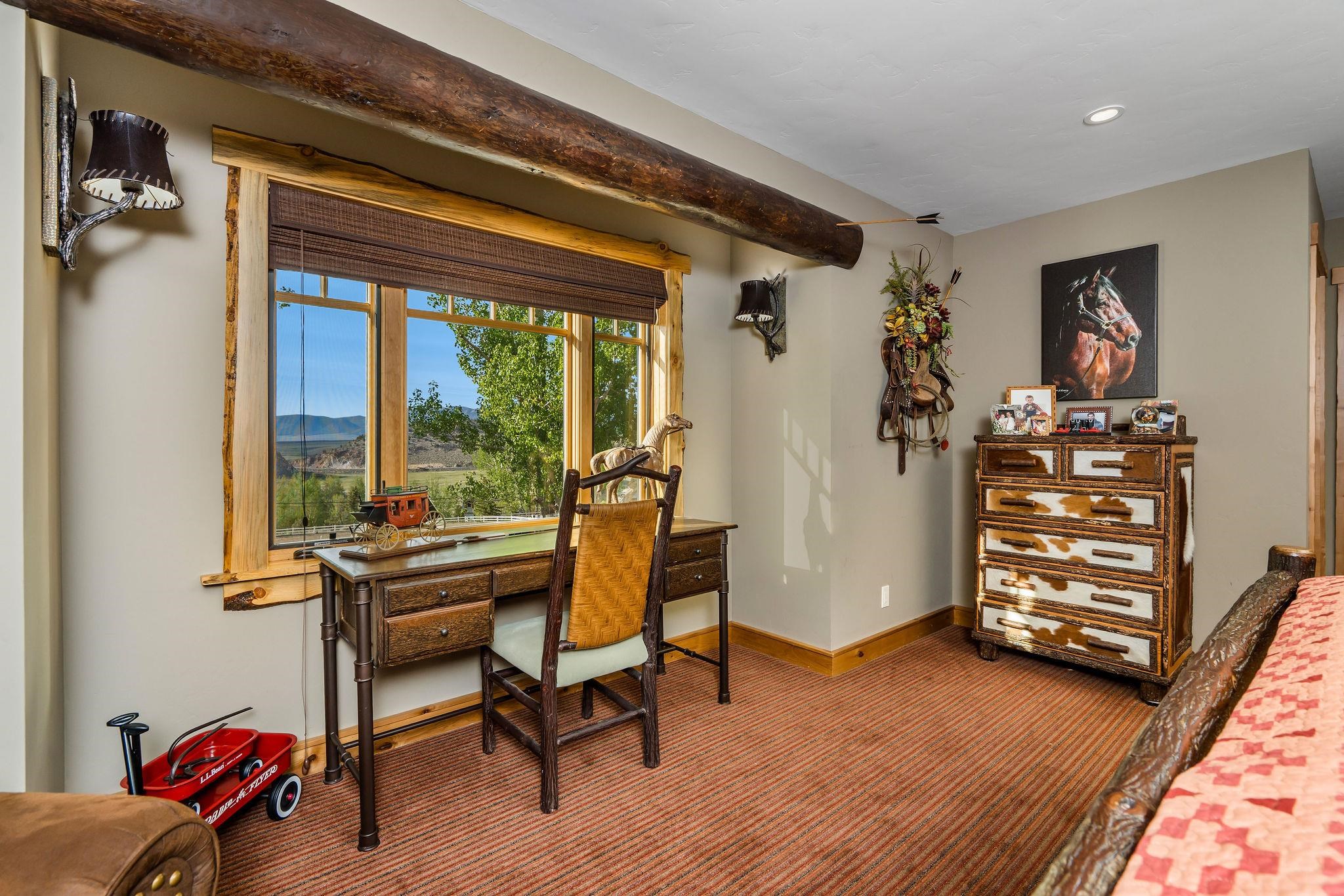 716 Aspen Springs Ranch Road, Unit 59012 Mammoth Lakes, CA 93546 - Photo 34 of 50 a view of a workspace with furniture and a window