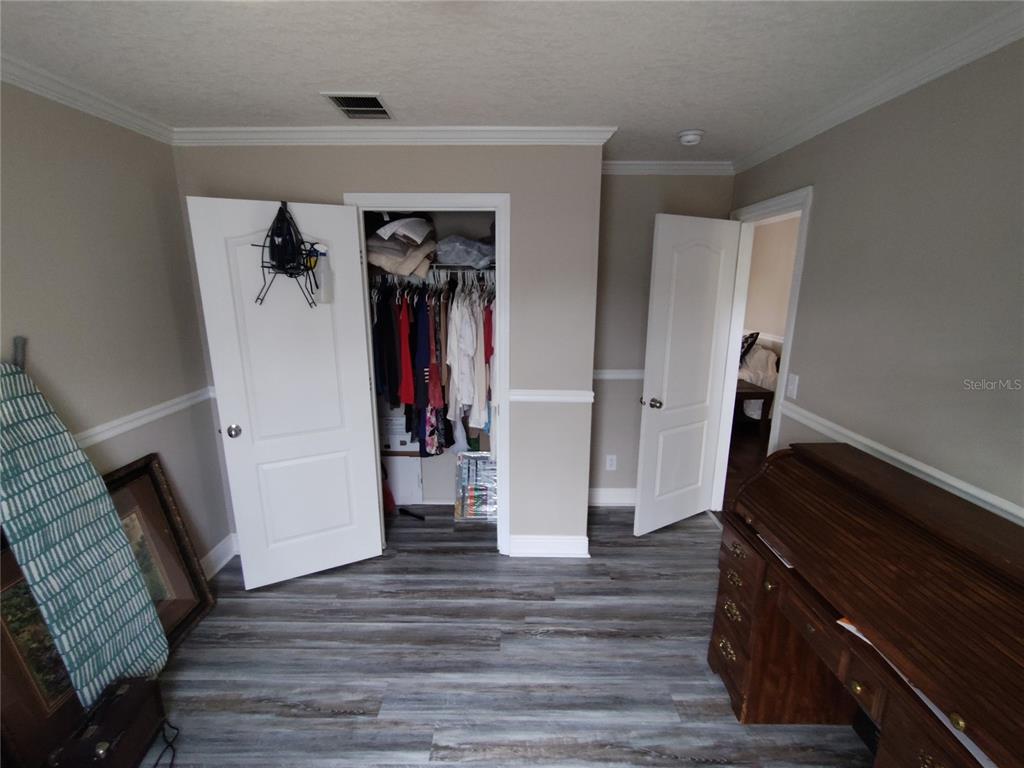 9811 Bud Street Hudson, FL 34669 - Photo 28 of 53 a view of walk in closet