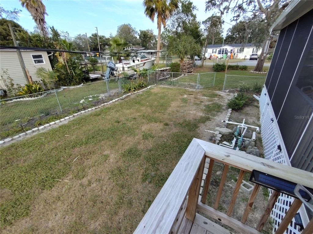 9811 Bud Street Hudson, FL 34669 - Photo 40 of 53 a view of a lake from a balcony
