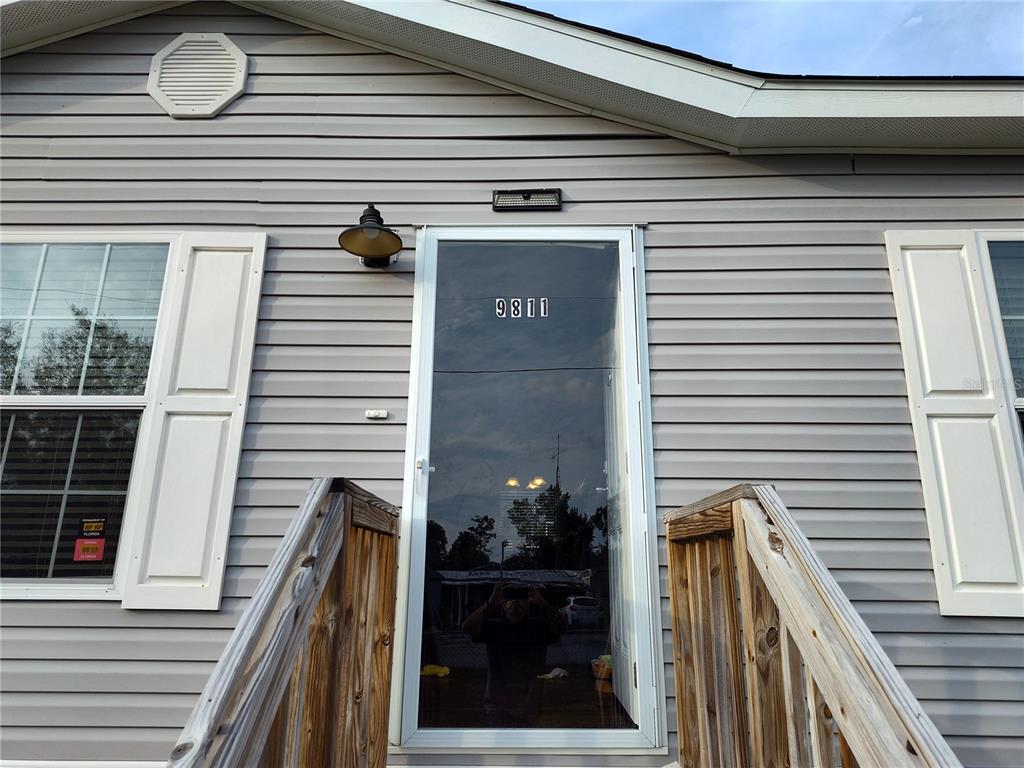 9811 Bud Street Hudson, FL 34669 - Photo 5 of 53 a view of a balcony