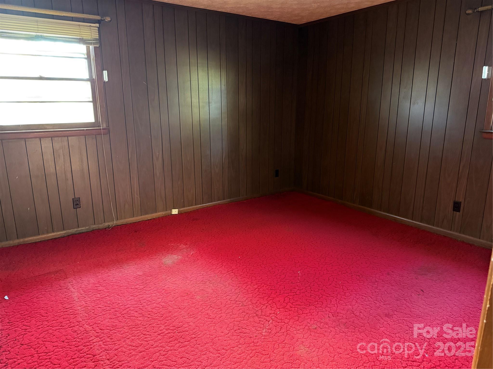 68 Sun Valley Drive Alexander, NC 28701 - Photo 7 of 15 an empty room with a window