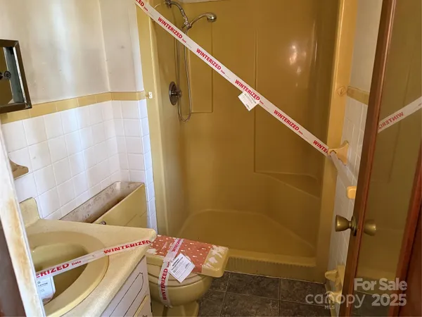 a bathroom with a sink and toilet