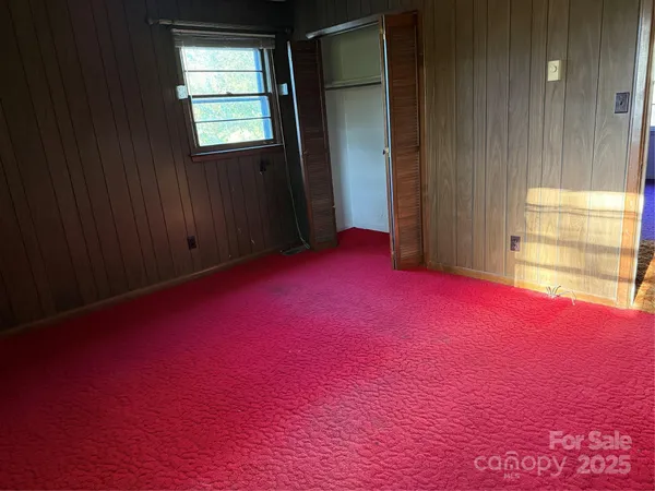 an empty room with a door