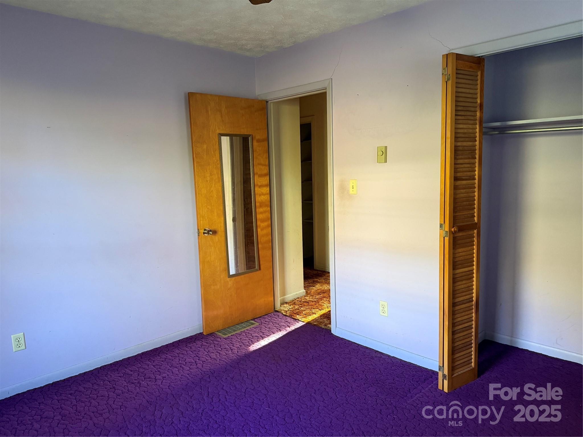 68 Sun Valley Drive Alexander, NC 28701 - Photo 10 of 15 an empty room with a door