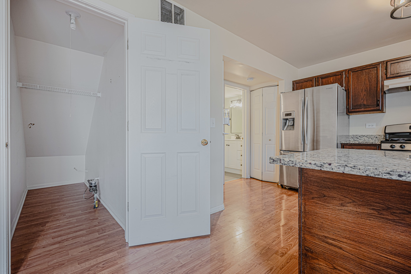 6743 Nantucket Court, Unit 6743 Gurnee, IL 60031 - Photo 13 of 30 a view of a kitchen from the hallway