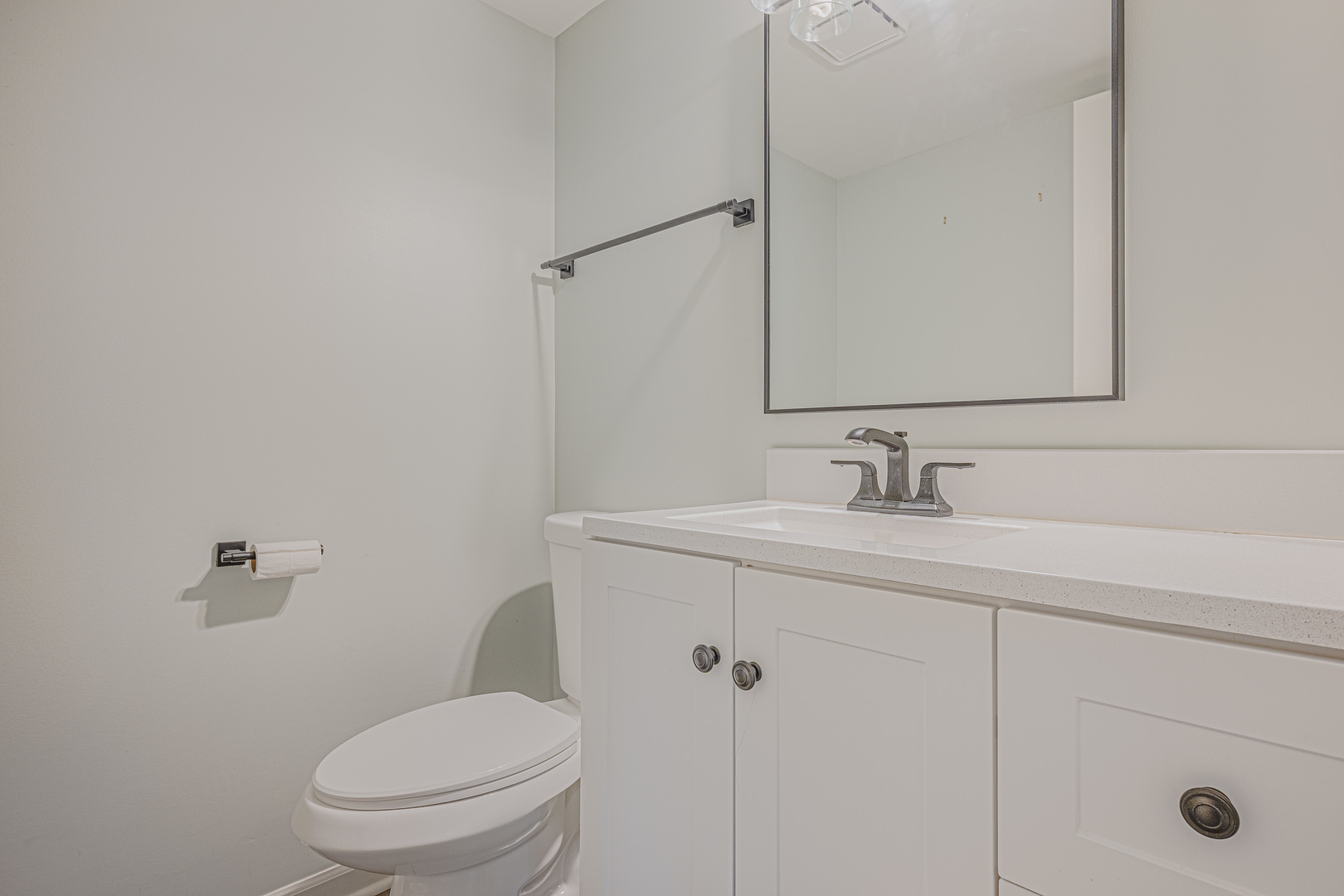 6743 Nantucket Court, Unit 6743 Gurnee, IL 60031 - Photo 22 of 30 a bathroom with a sink toilet and vanity