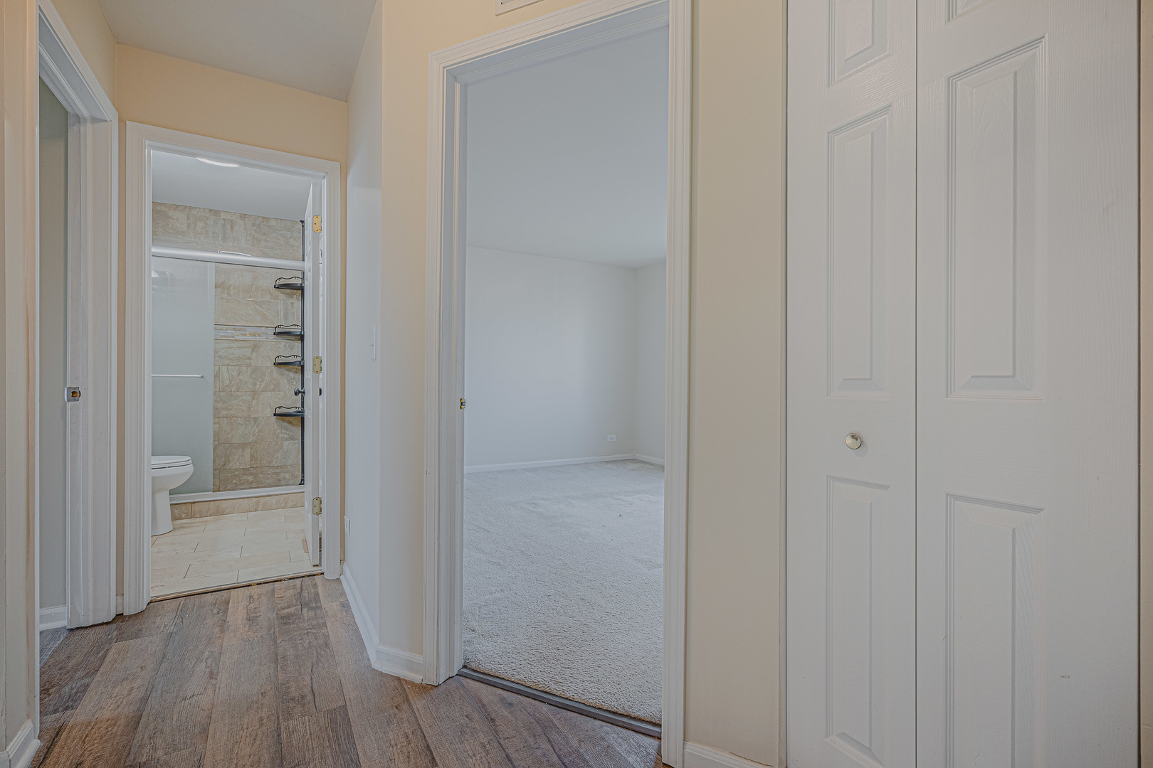 6743 Nantucket Court, Unit 6743 Gurnee, IL 60031 - Photo 23 of 30 a view of a hallway with wooden floor