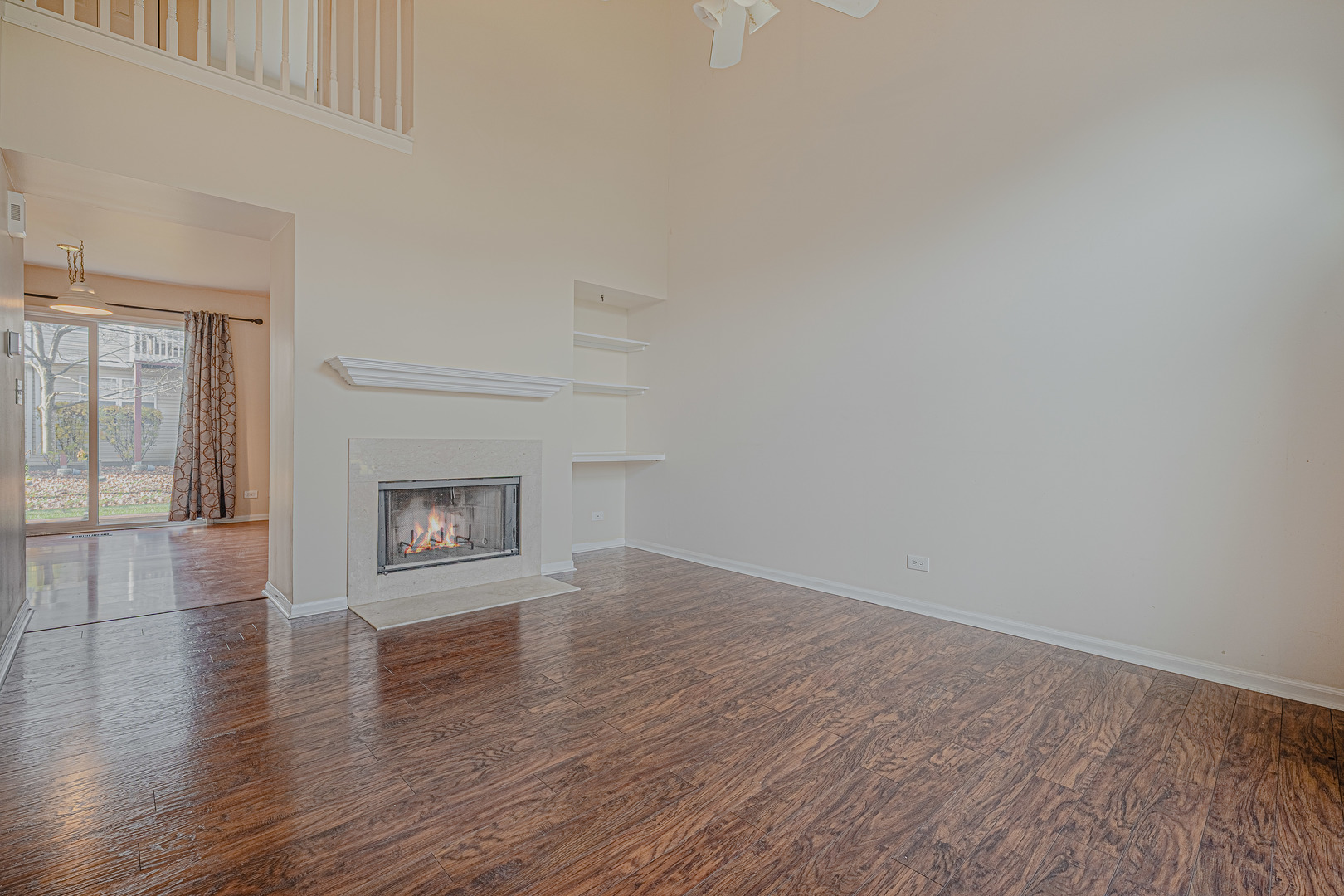 6743 Nantucket Court, Unit 6743 Gurnee, IL 60031 - Photo 4 of 30 a view of an empty room and glass door