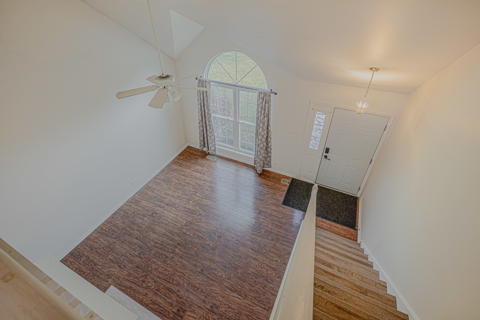 6743 Nantucket Court, Unit 6743 Gurnee, IL 60031 - Photo 6 of 30 an entryway of a house with wooden floor