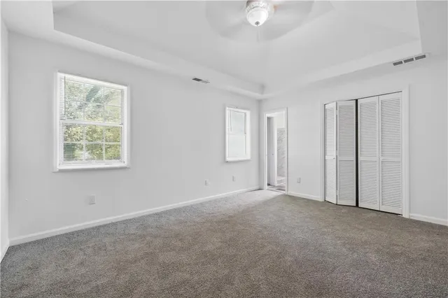 an empty room with windows