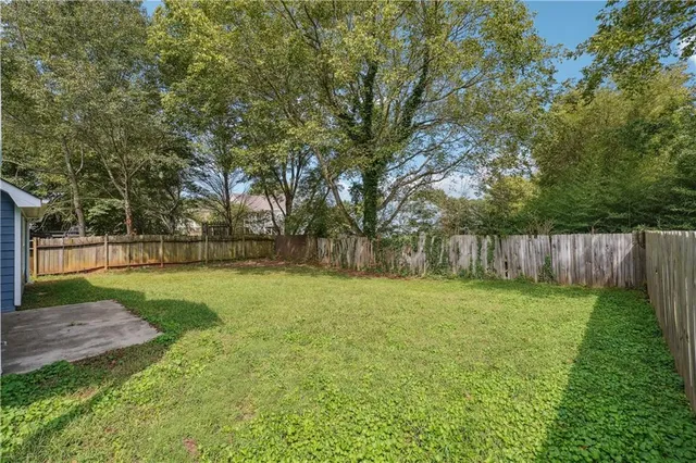 a view of a yard with a trees