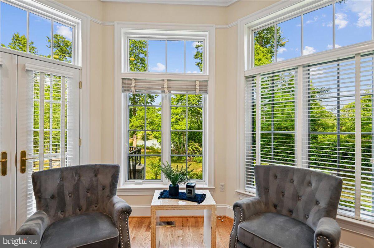 2700 Falling Timber Trail Edgewater, MD 21037 - Photo 27 of 89 a living room with furniture and a large window