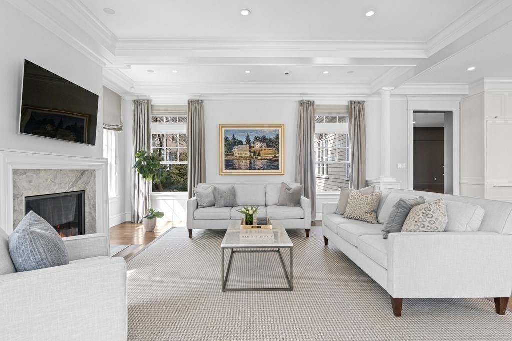 48 Everett Avenue Winchester, MA 01890 - Photo 11 of 42 a living room with furniture fireplace and flat screen tv