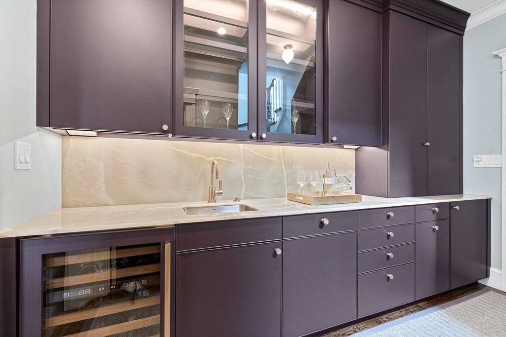 48 Everett Avenue Winchester, MA 01890 - Photo 14 of 42 a bathroom with a sink and a mirror