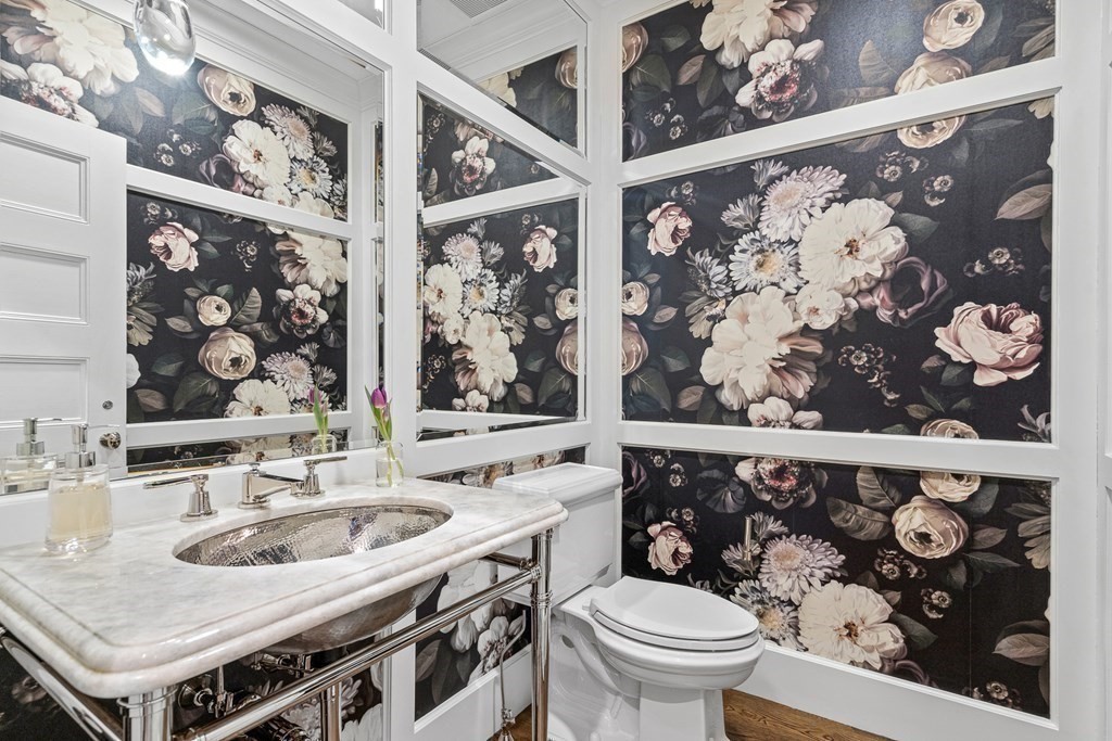 48 Everett Avenue Winchester, MA 01890 - Photo 15 of 42 a bathroom with a sink toilet and shower