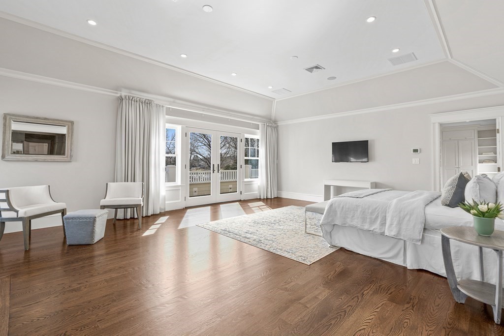 48 Everett Avenue Winchester, MA 01890 - Photo 21 of 42 a living room with furniture and wooden floor
