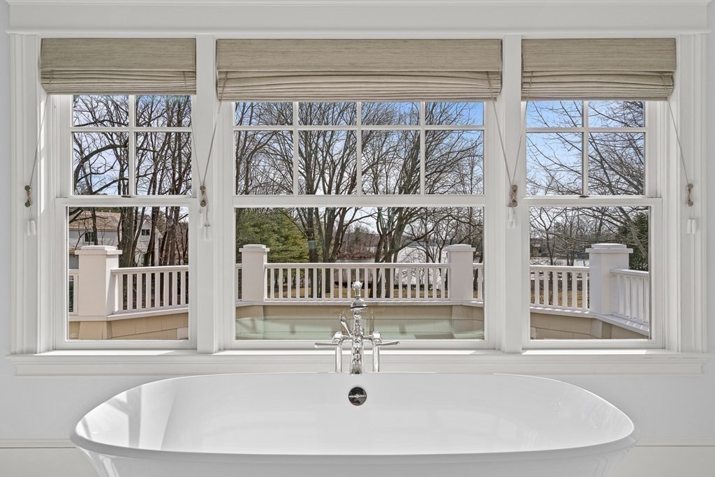 48 Everett Avenue Winchester, MA 01890 - Photo 25 of 42 a bathroom with a sink and a bathtub