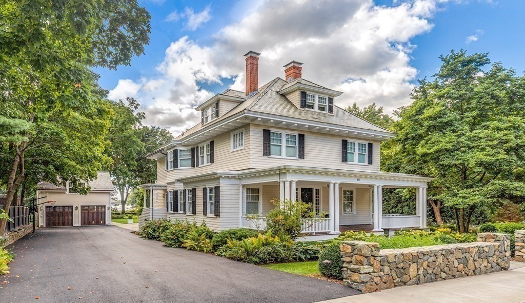 48 Everett Avenue Winchester, MA 01890 - Photo 3 of 42 a front view of a house with garden