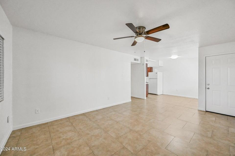 1518 West Colter Street, Unit 10 Phoenix, AZ 85015 - Photo 4 of 14 a view of an empty room