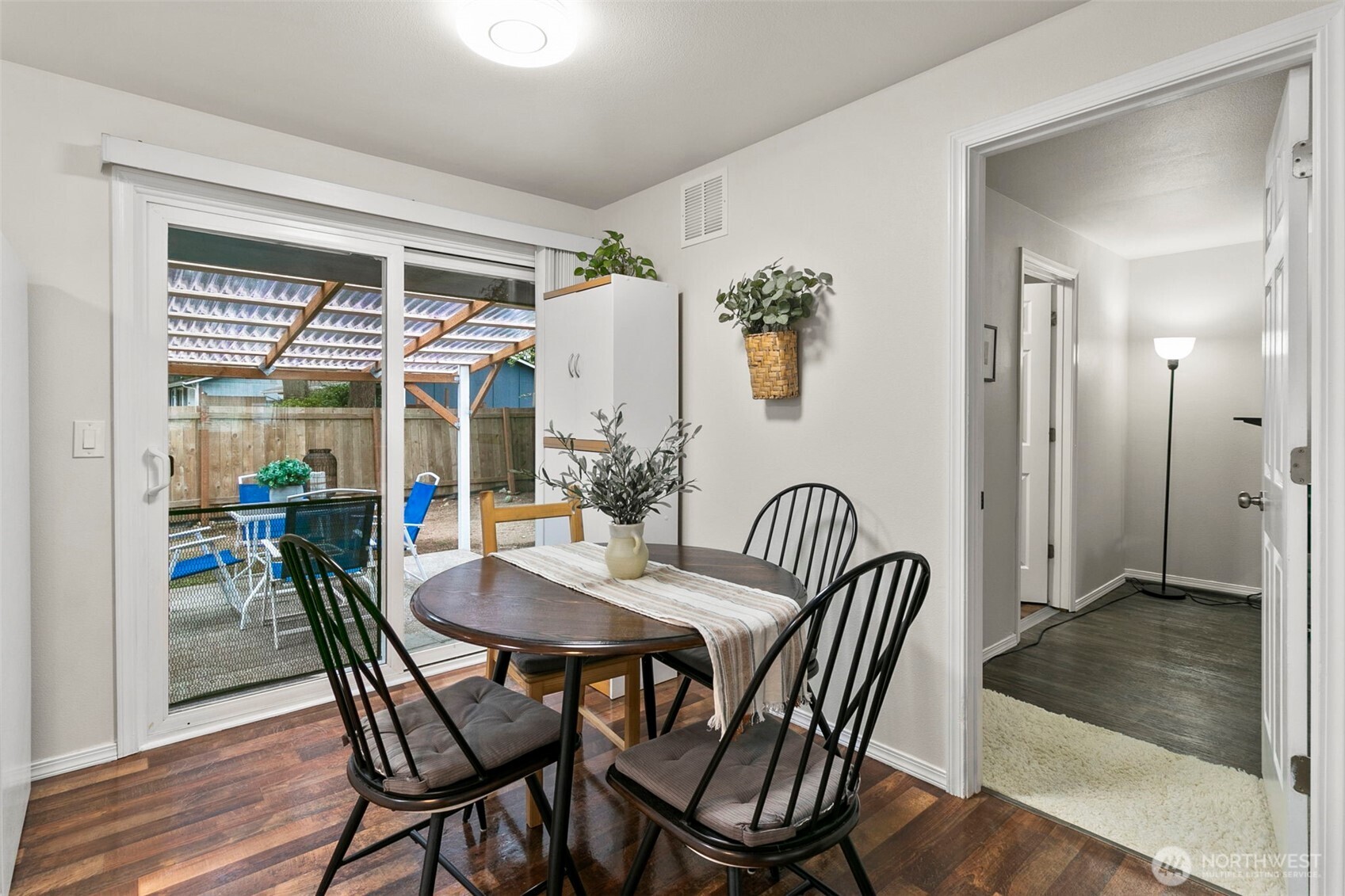 26604 191st Place Southeast Covington, WA 98042 - Photo 13 of 34 a view of a dining room with furniture window and wooden floor