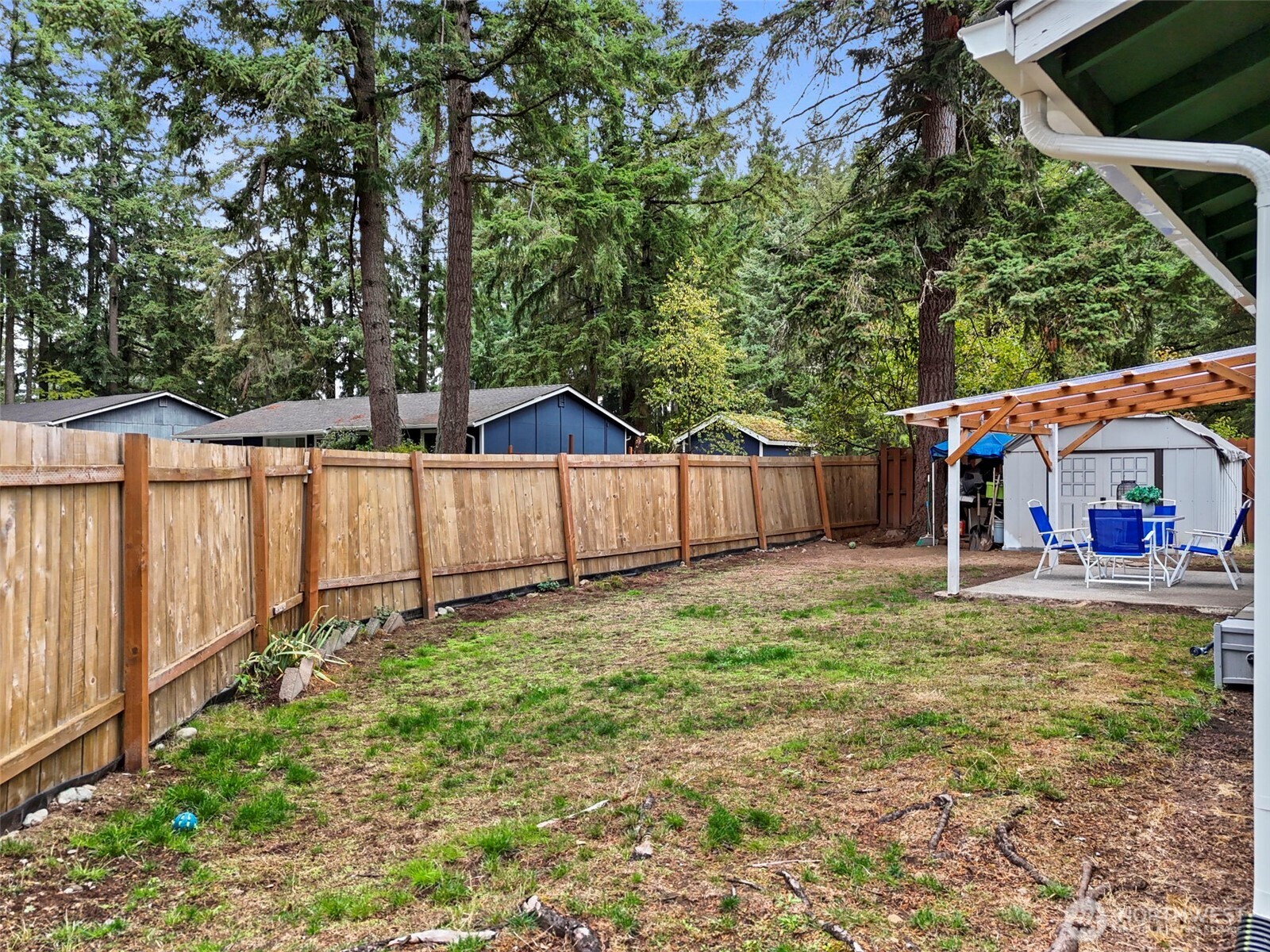 26604 191st Place Southeast Covington, WA 98042 - Photo 26 of 34 a backyard of a house with wooden floor