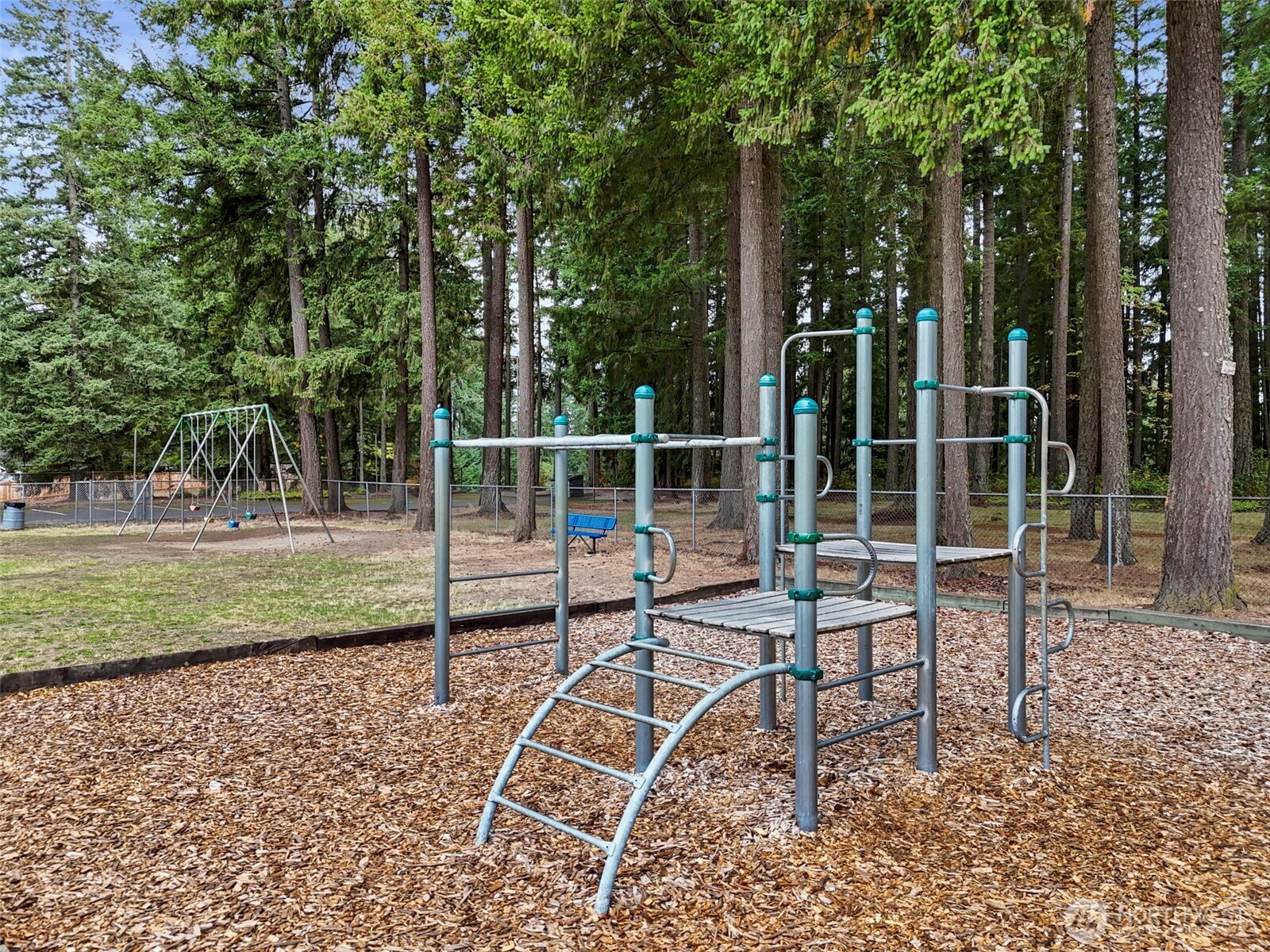 26604 191st Place Southeast Covington, WA 98042 - Photo 33 of 34 a view of a chair and fire pit in the yard