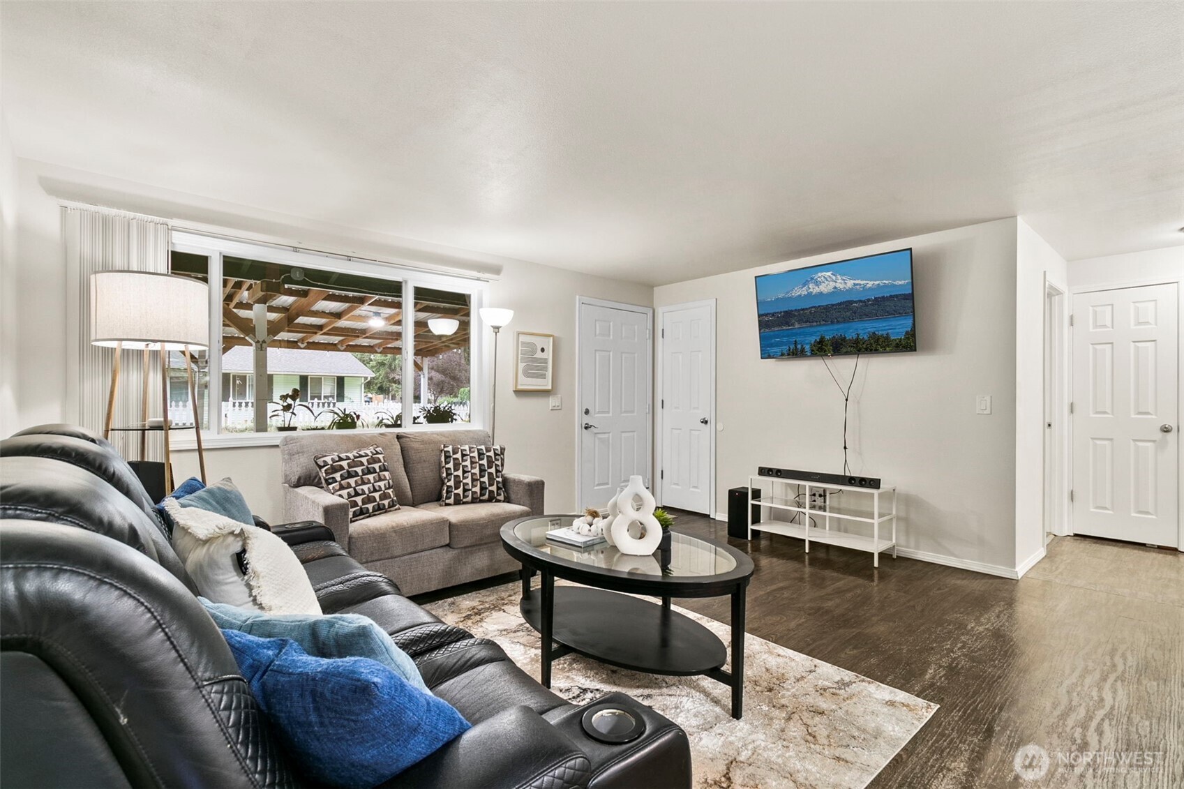 26604 191st Place Southeast Covington, WA 98042 - Photo 4 of 34 a living room with furniture and a flat screen tv