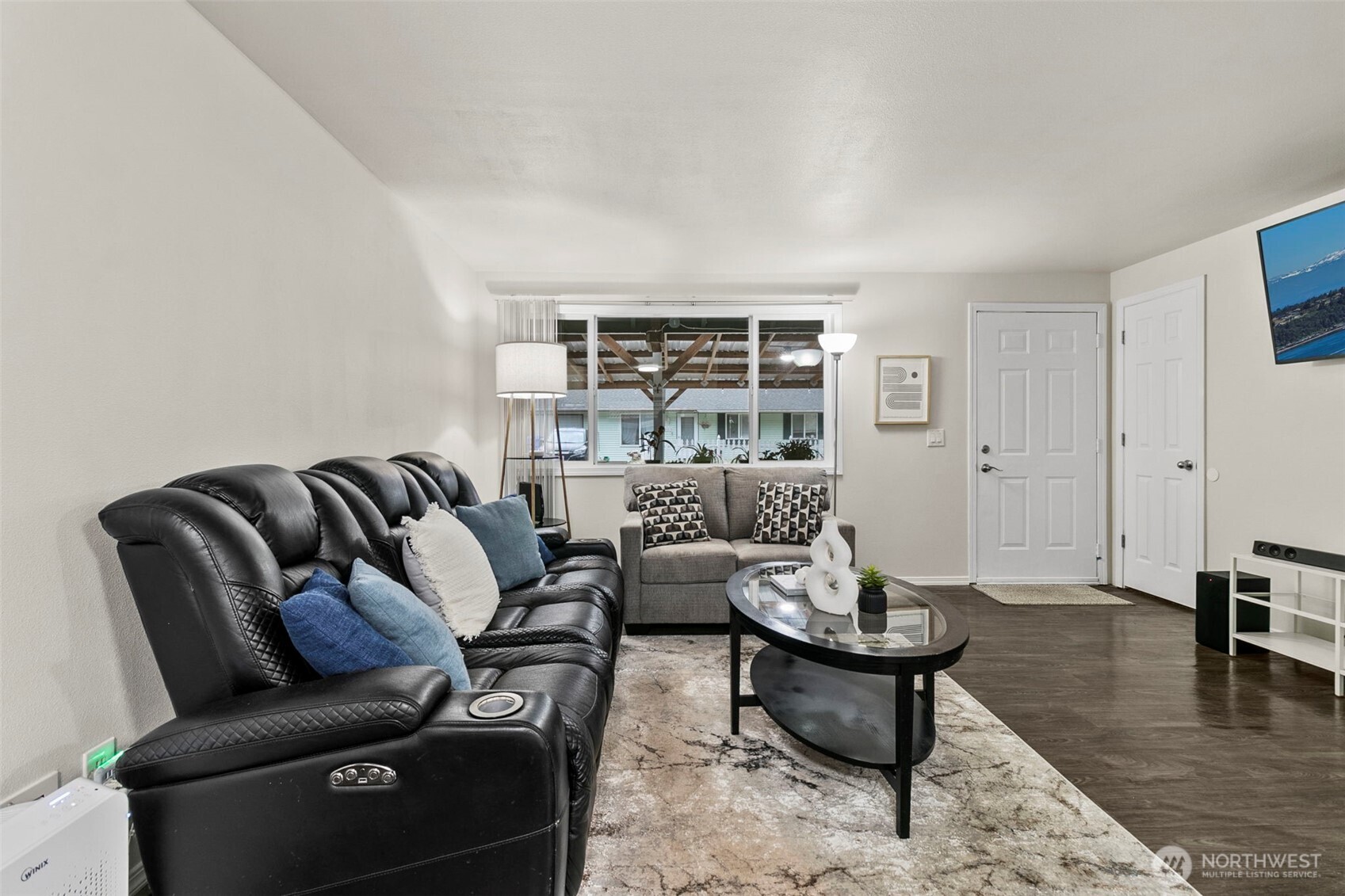 26604 191st Place Southeast Covington, WA 98042 - Photo 5 of 34 a living room with furniture and a large window