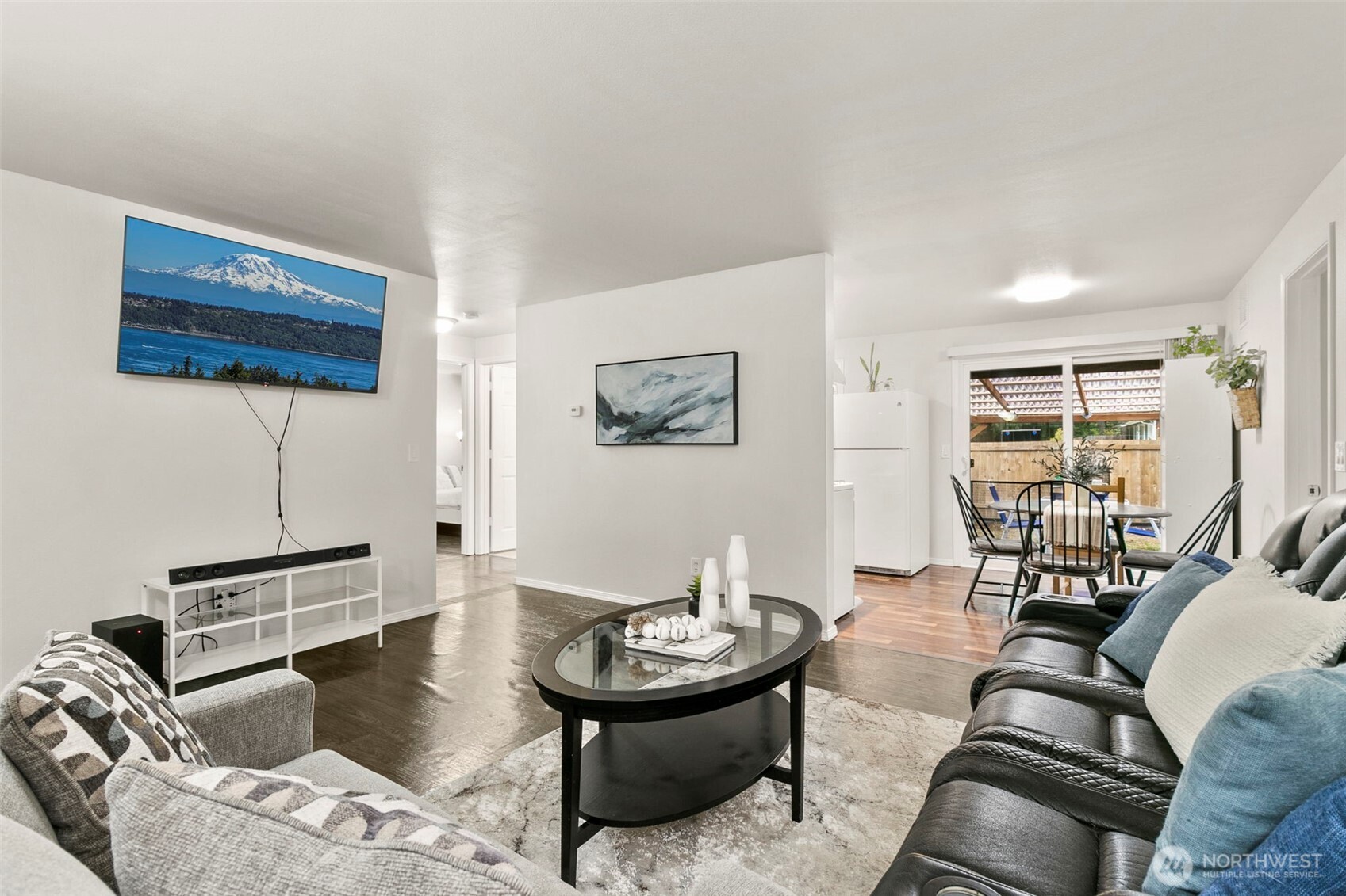 26604 191st Place Southeast Covington, WA 98042 - Photo 6 of 34 a living room with furniture and wooden floor