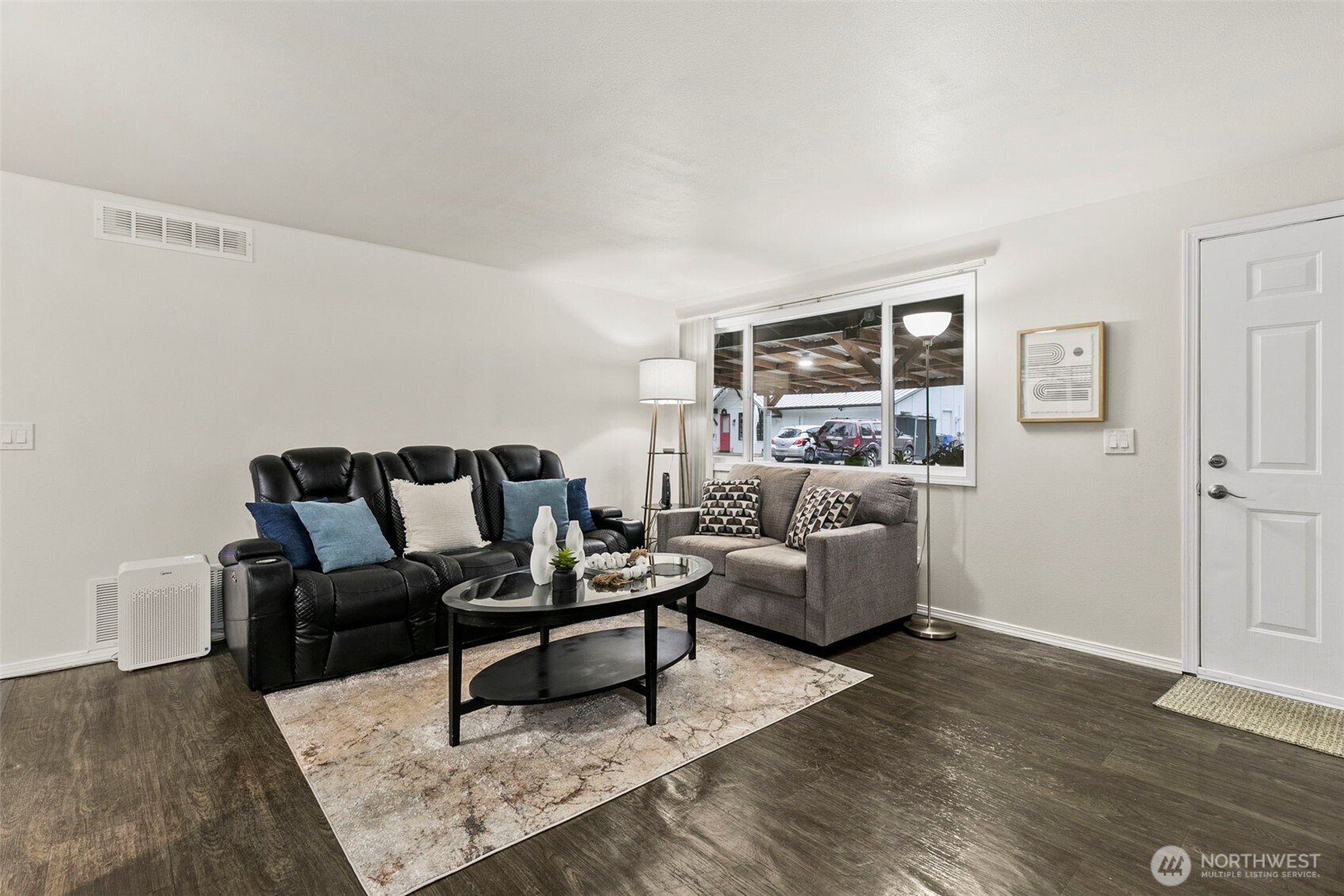 26604 191st Place Southeast Covington, WA 98042 - Photo 7 of 34 a living room with furniture and wooden floor