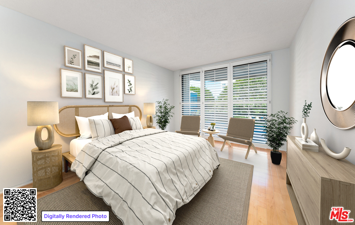 2910 Neilson Way, Unit 308 Santa Monica, CA 90405 - Photo 13 of 32 a bedroom with a bed a dresser with wooden floor