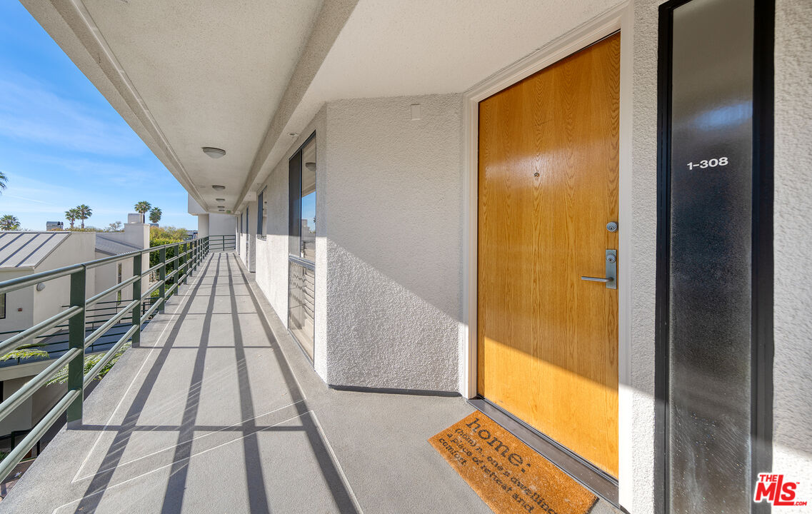 2910 Neilson Way, Unit 308 Santa Monica, CA 90405 - Photo 2 of 32 a view of balcony with wooden floor