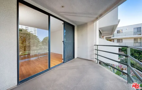 a view of a balcony with an outdoor space