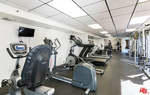 a view of a room with gym equipment