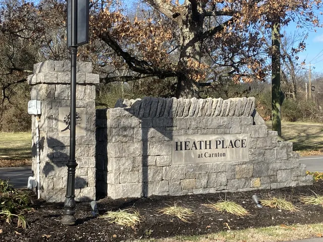 a sign on the side of a road