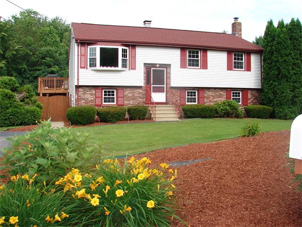 17 Coach Road Billerica, MA 01862 - Photo 1 of 1 a view of a house with a yard
