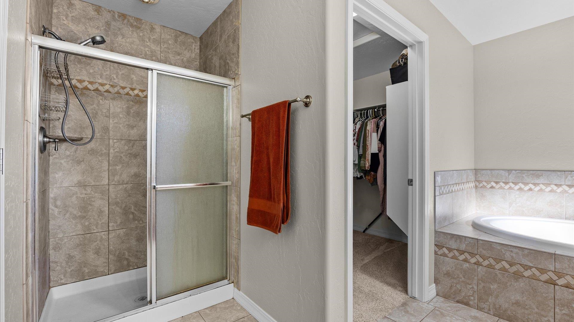 1427 Satterfield Avenue Fruita, CO 81521 - Photo 18 of 29 a bathroom with a shower and a sink