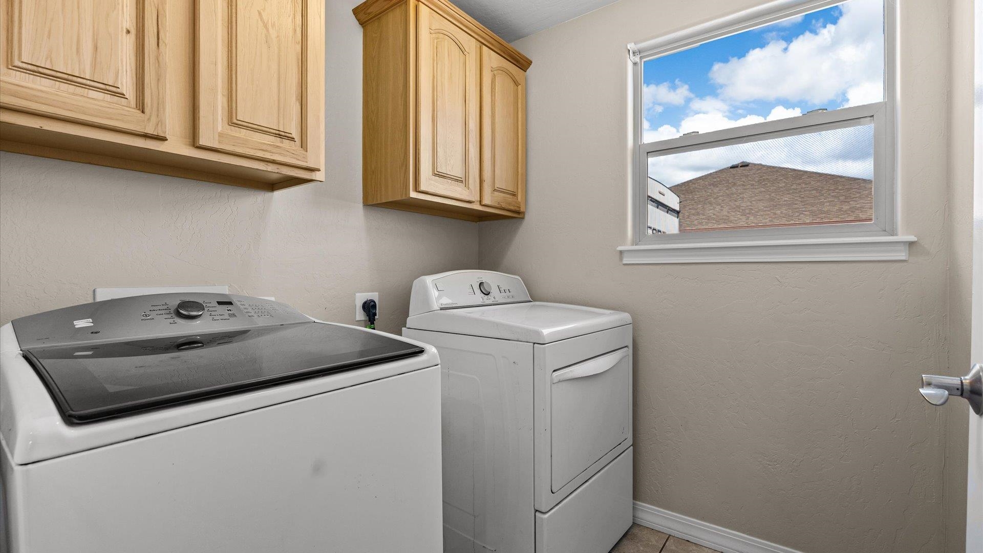 1427 Satterfield Avenue Fruita, CO 81521 - Photo 25 of 29 a utility room with dryer and washer