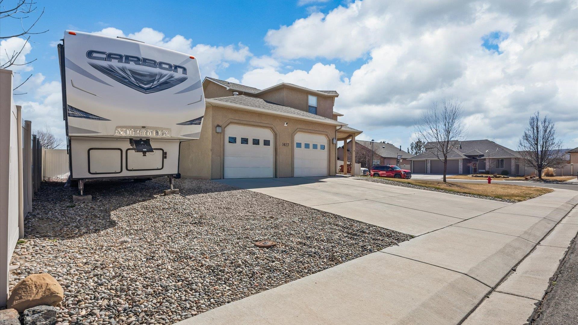 1427 Satterfield Avenue Fruita, CO 81521 - Photo 28 of 29 a view of a house with a patio