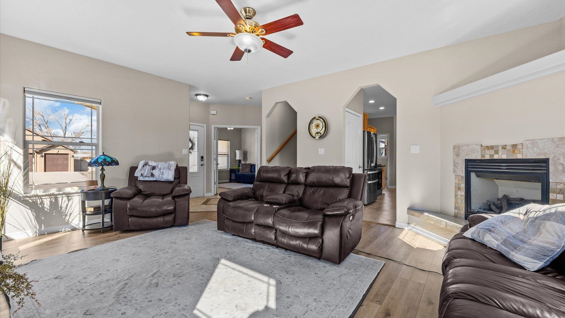 1427 Satterfield Avenue Fruita, CO 81521 - Photo 6 of 29 a living room with furniture and a fireplace