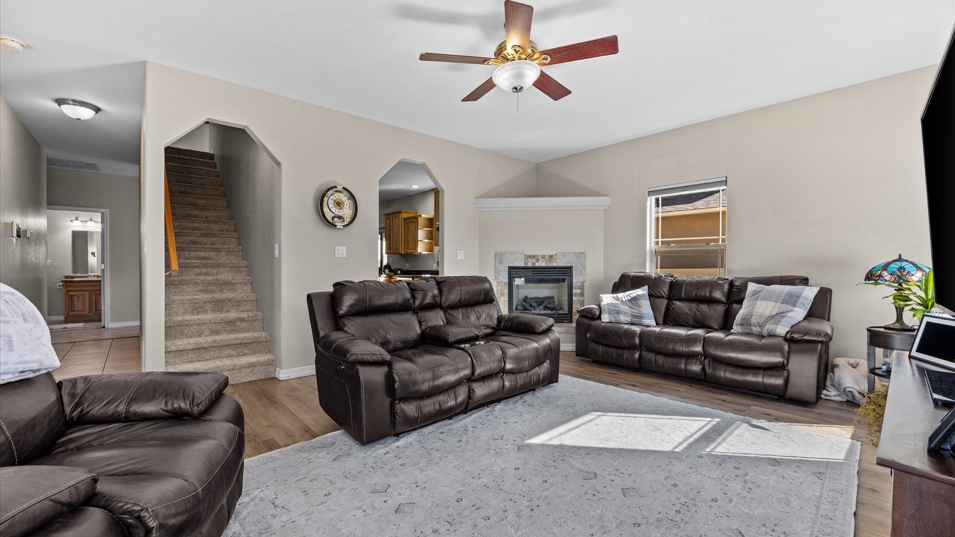 1427 Satterfield Avenue Fruita, CO 81521 - Photo 7 of 29 a living room with furniture and a flat screen tv