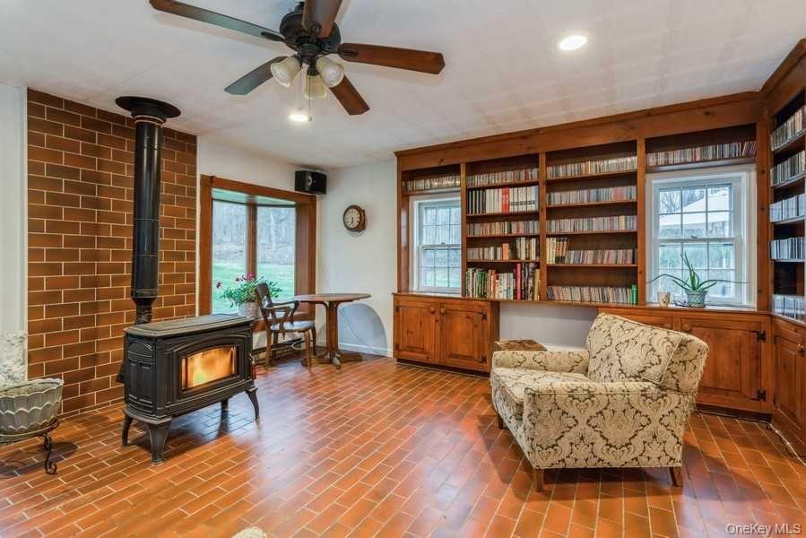 1141 Beekman Road Hopewell Junction, NY 12533 - Photo 9 of 36 a living room with furniture and a window