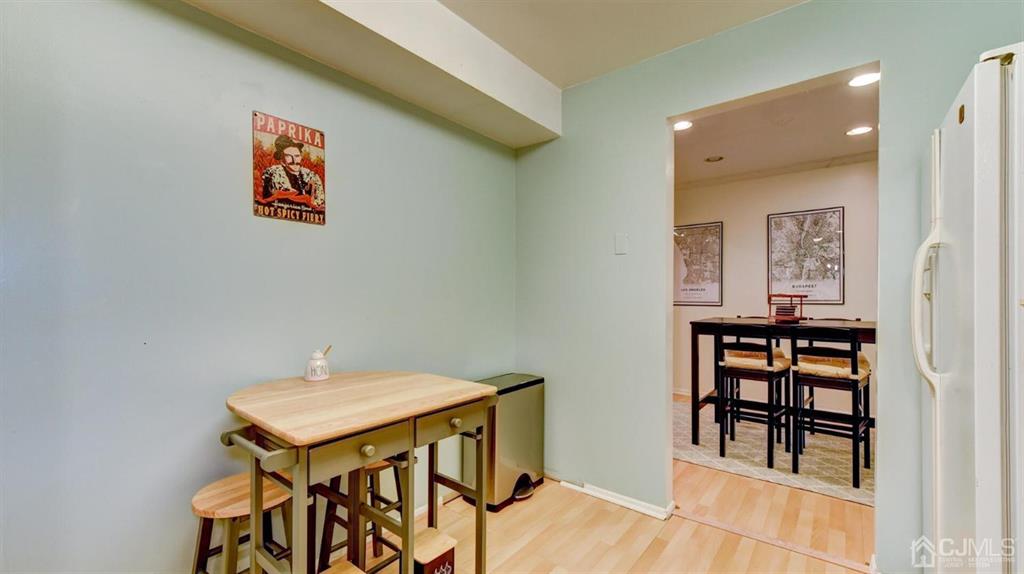 3 The Crescent Clinton, NJ 08809 - Photo 21 of 37 a view of a dining room with furniture and wooden floor