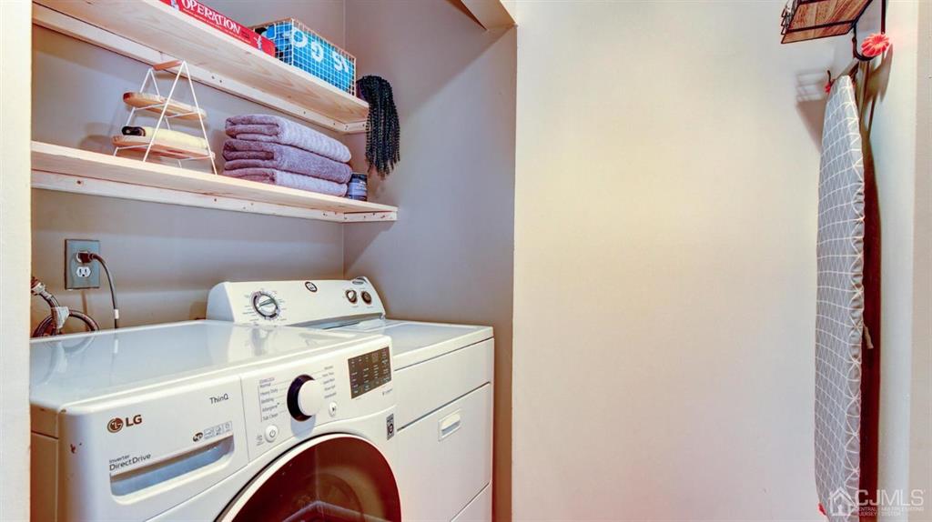 3 The Crescent Clinton, NJ 08809 - Photo 25 of 37 a utility room with dryer and washer